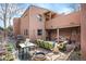 Backyard patio area featuring a built-in grill, seating, and ample space for outdoor dining and entertaining at 469 Elati St, Denver, CO 80204