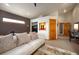 Modern living room with contemporary furniture, large windows, and ample natural light, creating an inviting space at 469 Elati St, Denver, CO 80204