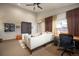 Bright living room with a ceiling fan, large windows, and sleek furniture offers a comfortable and stylish space at 469 Elati St, Denver, CO 80204