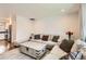 Comfortable living room with hardwood floors and bright natural light at 2034 S Idalia St, Aurora, CO 80013