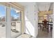 Bright dining area features ample storage, large windows for natural light, and a view of the city and parking lot at 130 N Pearl St # 304, Denver, CO 80203