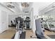 Spacious gym with fitness equipment including treadmills, elliptical machines, and stationary bikes at 130 N Pearl St # 304, Denver, CO 80203