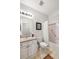 Cozy bathroom with single vanity and shower-tub combination at 23421 E Long Pl, Aurora, CO 80016