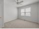 Comfortable bedroom with natural light and neutral carpeting at 23421 E Long Pl, Aurora, CO 80016