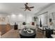 Cozy living room with a comfortable sofa, stylish decor, and an open layout at 23421 E Long Pl, Aurora, CO 80016