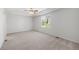 Spacious main bedroom features a tray ceiling and a ceiling fan at 23421 E Long Pl, Aurora, CO 80016