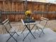 Patio with bistro set in private backyard at 1078 Oak Cir, Denver, CO 80215