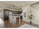 Modern kitchen with stainless steel appliances and a stylish island at 1078 Oak Cir, Denver, CO 80215