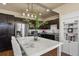 Modern kitchen with stainless steel appliances and a stylish island at 1078 Oak Cir, Denver, CO 80215