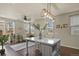 Open-concept living space with a view from a bright kitchen at 1078 Oak Cir, Denver, CO 80215