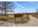 Sunnyside Park sign with playground and bridge in distance at 1078 Oak Cir, Denver, CO 80215