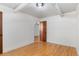 Cozy bedroom with hardwood floors, closet, overhead lighting, and neutral walls at 2533 E 11Th Ave # 1, Denver, CO 80206