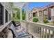 Front porch with seating and view of neighboring houses at 5723 S Union Ct, Littleton, CO 80127