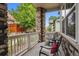 Relaxing front porch with small table and chairs at 5723 S Union Ct, Littleton, CO 80127