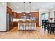 Well-equipped kitchen with wood cabinets and an island at 5723 S Union Ct, Littleton, CO 80127