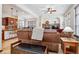 Open living room with a fireplace and built-in shelving at 5723 S Union Ct, Littleton, CO 80127