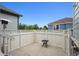 Private patio with a small table and white fence at 5723 S Union Ct, Littleton, CO 80127