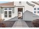 Close up of a home's front entrance with visible street address and modern architectural details at 9796 W Hinsdale Pl # 4, Littleton, CO 80128