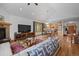 Spacious open concept layout with hardwood floors, fireplace and eat in kitchen at 27711 Moffat Rd, Evergreen, CO 80439