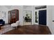 Bright entryway boasting hardwood floors, a high ceiling, and a front office with a large window at 810 Trail Ridge Dr, Louisville, CO 80027