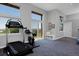 Bright workout room with ample natural light and exercise equipment at 810 Trail Ridge Dr, Louisville, CO 80027