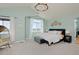 Spacious main bedroom with high ceilings, large windows, and sitting area at 810 Trail Ridge Dr, Louisville, CO 80027