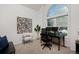 Inviting office space featuring plush carpet, a picture window, and neutral walls at 810 Trail Ridge Dr, Louisville, CO 80027