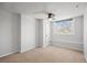 Simple and bright bedroom with ceiling fan and window at 2336 N High St, Denver, CO 80205