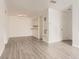 Dining area with wood-look floors and kitchen passthrough at 7185 S Gaylord St # G13, Littleton, CO 80122