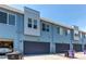 Modern townhomes featuring attached garages and appealing contemporary design at 2346 Central Park Blvd, Denver, CO 80238