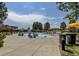 Community pool area with a splash pad, umbrellas, and plenty of seating at 2346 Central Park Blvd, Denver, CO 80238