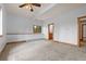 Bedroom featuring a window, ceiling fan, and doorway into an ensuite bathroom at 510 Hill Dr, Sedalia, CO 80135