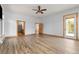 Expansive bedroom with wood flooring, natural light and multiple entry-ways to other rooms at 510 Hill Dr, Sedalia, CO 80135