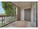 Balcony with tan rug and a wooden railing, with views of the community at 9160 E Arbor Cir # F, Englewood, CO 80111