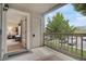 Balcony view of the apartment community with a sliding glass door and a door to the outside at 9160 E Arbor Cir # F, Englewood, CO 80111