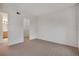 Spacious carpeted bedroom with neutral walls and ensuite bathroom and walk-in closet at 9160 E Arbor Cir # F, Englewood, CO 80111