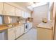 Clean kitchen with updated appliances, lots of light, and ample storage at 6420 E Bates Ave, Denver, CO 80222