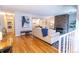 Inviting living room featuring a stone fireplace and natural light at 6420 E Bates Ave, Denver, CO 80222