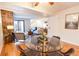 Cozy living and dining areas with hardwood floors and natural light at 6420 E Bates Ave, Denver, CO 80222