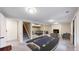 Finished basement features an entertainment console, game table, and a cozy fireplace at 8663 E Davies Ave, Centennial, CO 80112