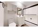 Clean bathroom with a sink, toilet, vanity, and shower with a sliding door at 8663 E Davies Ave, Centennial, CO 80112