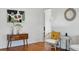 Cozy living room with hardwood flooring, stylish accents, and comfortable seating arrangement at 4720 Perry St, Denver, CO 80212