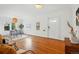 Warm and inviting living room with hardwood floors, white walls, and stylish furniture at 4720 Perry St, Denver, CO 80212