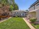 Nice backyard with lush lawn, back deck and storage shed at 3645 S Fox St, Englewood, CO 80110