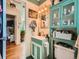 Stylish bathroom featuring vanity, mirror, and artistic décor at 3645 S Fox St, Englewood, CO 80110