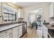 Kitchen view of eating area with access to balcony at 10960 W Florida Ave # 113, Lakewood, CO 80232