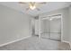 Bedroom with carpet, mirrored closet and ceiling fan at 857 S Van Gordon Ct # H101, Lakewood, CO 80228