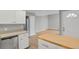 Updated kitchen with an island, stainless steel appliances, and hardwood floors at 857 S Van Gordon Ct # H101, Lakewood, CO 80228