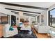 Bright living room with hardwood floors, modern furniture, and a large window, offering a comfortable and inviting space at 5275 S University Blvd, Greenwood Village, CO 80121