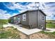 Exterior view of the home featuring a concrete walk-out at 28505 County Road 5, Elizabeth, CO 80107
